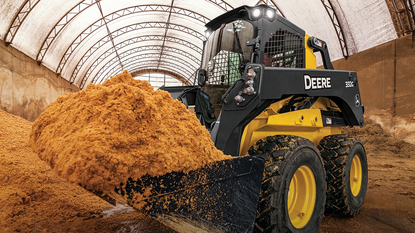 John Deere 332G Skid Steer Loader with full bucket