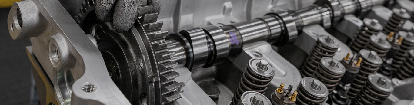 Man working at engine works facility