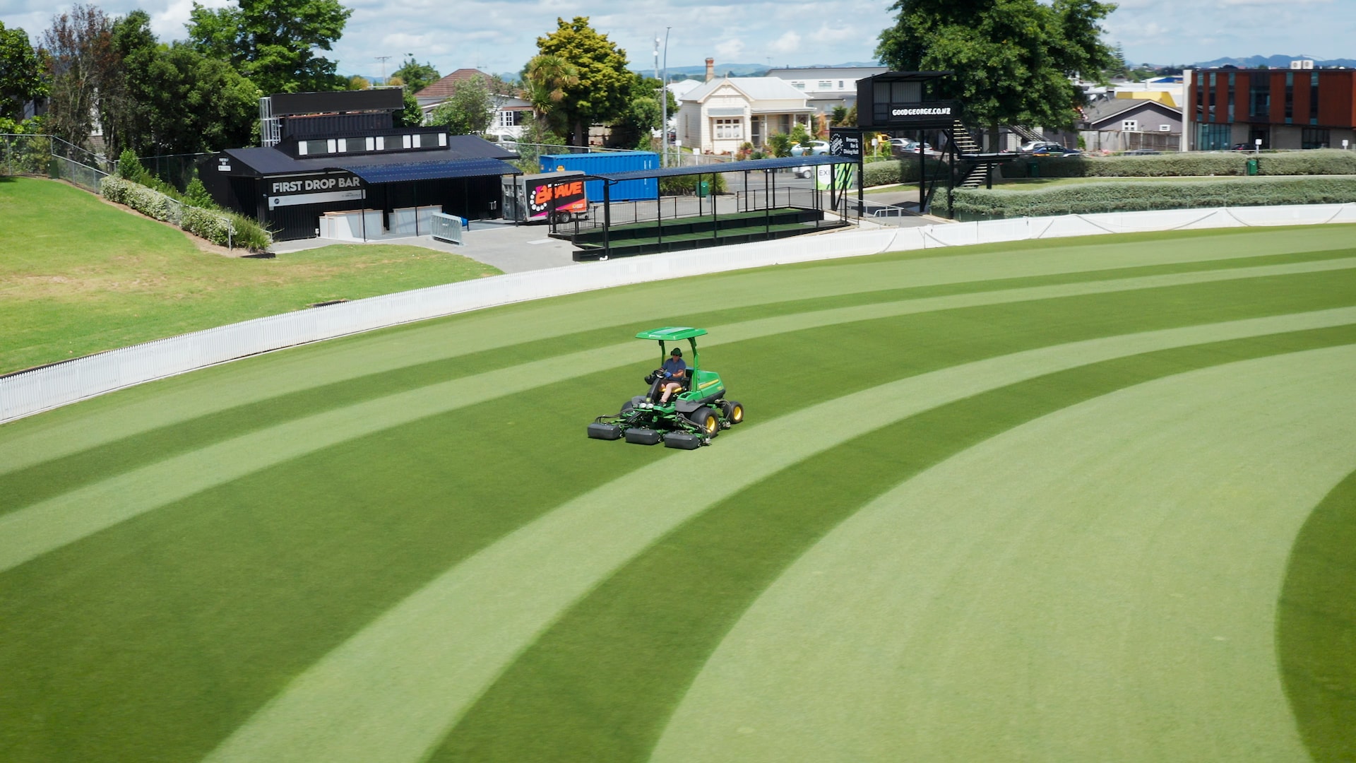 Karl mowing the sports grounds on his triplex mower