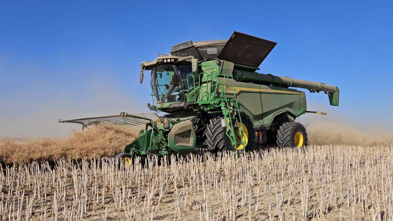 John Deere X-Series Combine in a field