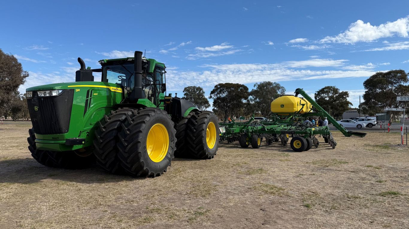9R 490 Tractor displayed with P640 Precision Air Hoe Drill.