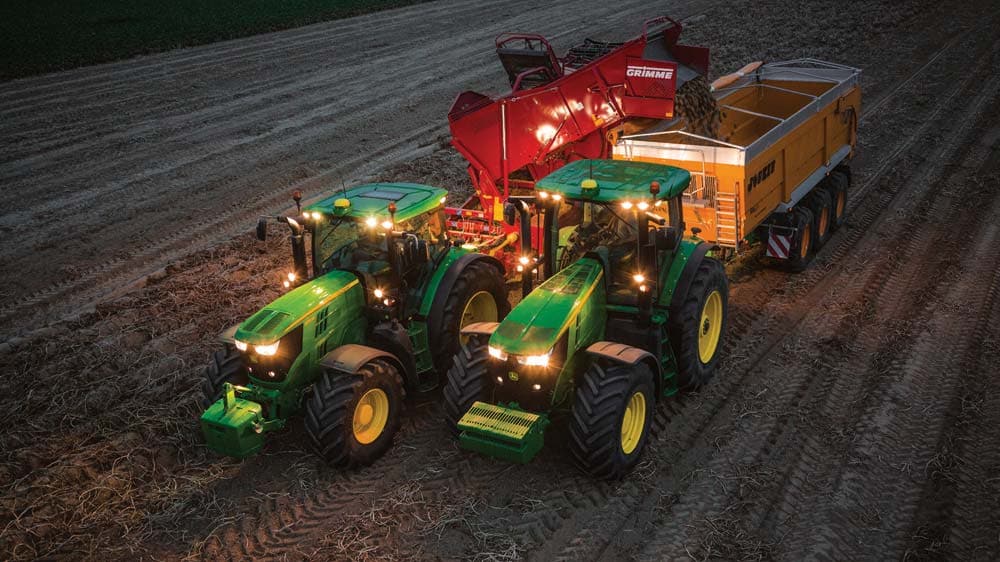 John Deere agricultural equipment on a field