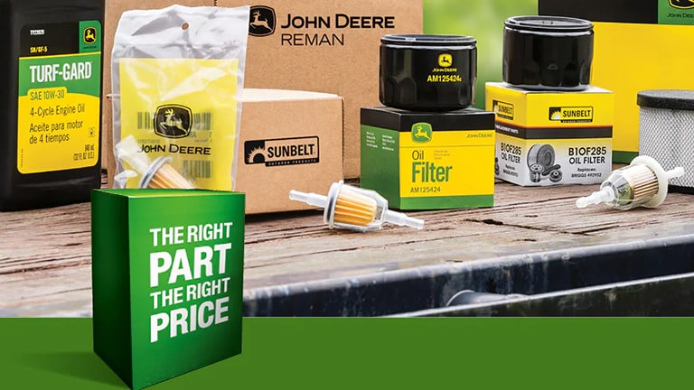 a variety of John&nbsp;Deere parts on a countertop