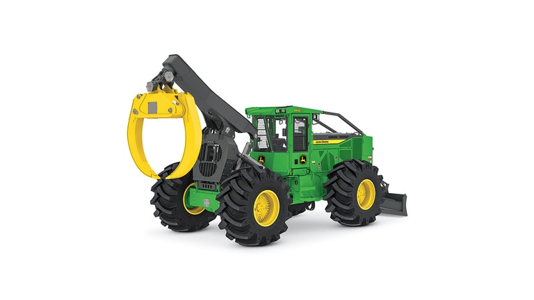 Green and yellow forestry machine with large tires and front grapple attachment.