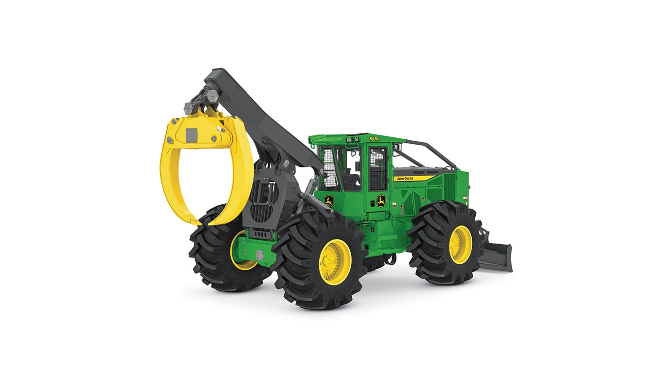 Green and yellow John Deere forestry skidder with large tires and grapple attachment.