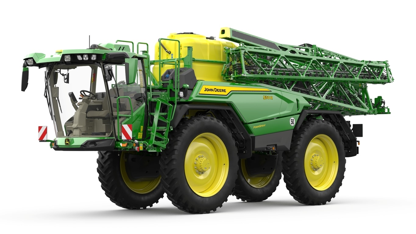 John Deere 550R self‑propelled sprayer with folded spray boom and large tank, isolated on a white background.