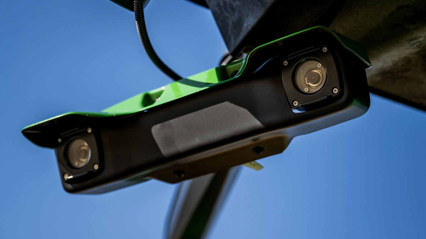 Forward facing cameras on a combine cab