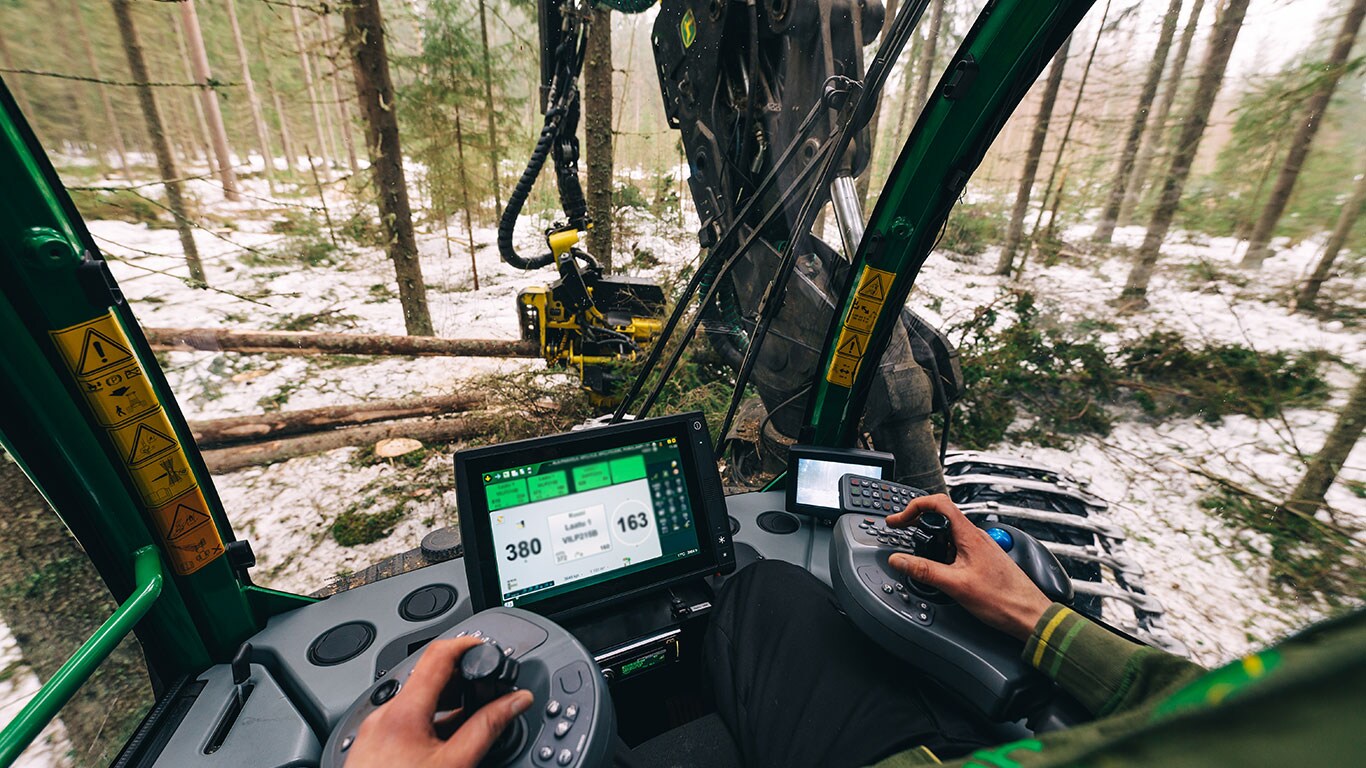Harvester operator at work