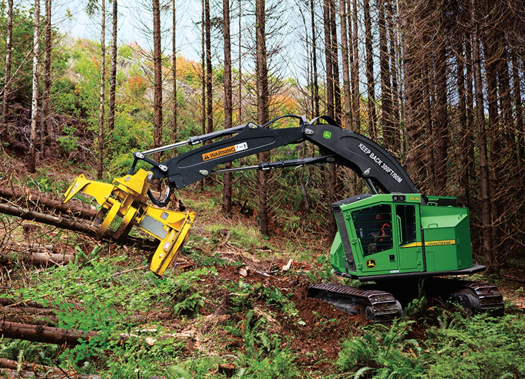 Feller Buncher 859M working in the forest