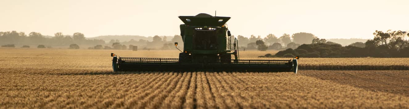 Harvester in field