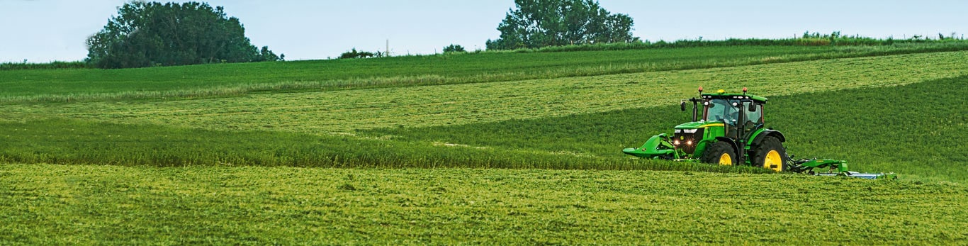 Agriculture photo scene of tractor in field