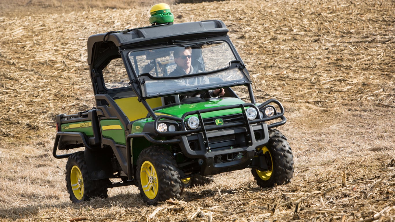 gator with attachments on a ranch