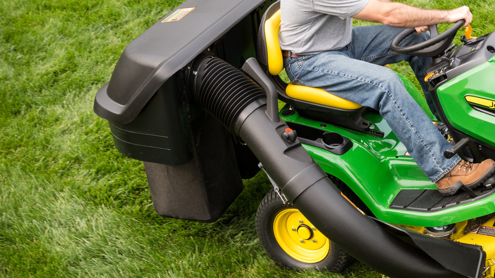 image of bagger system attached to lawn tractor