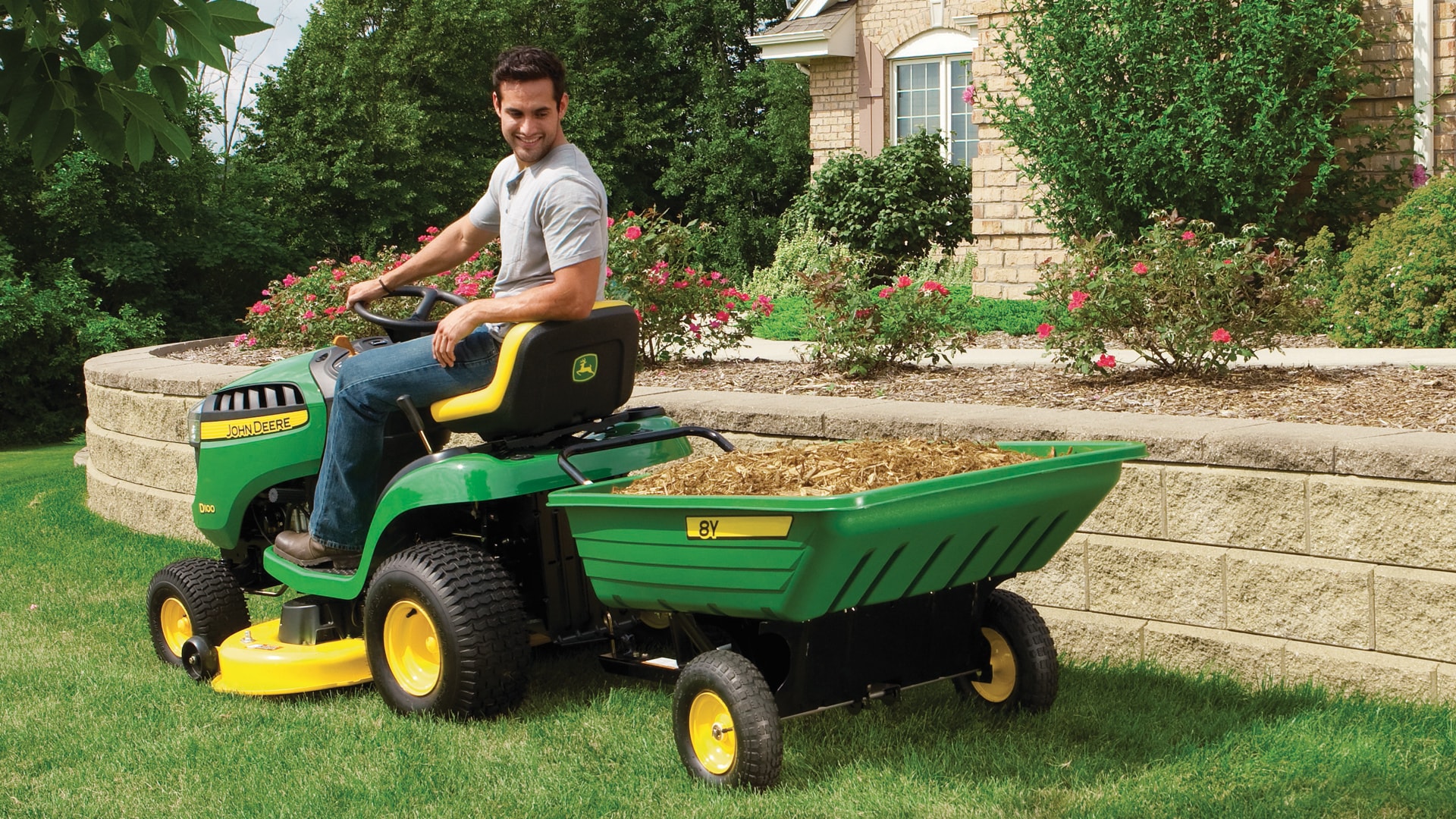 image of cart attached to lawn tractor