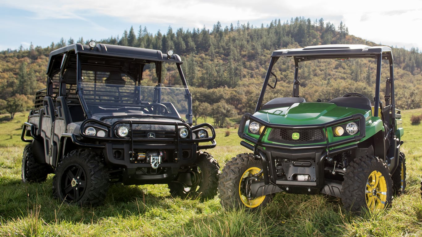 image of two crossover gator models in rolling hills