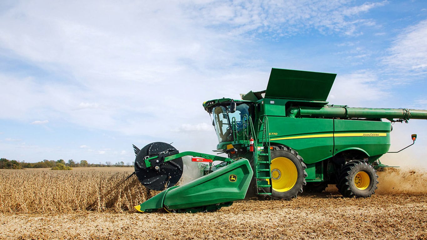 Field image of a combine with HDF35 header