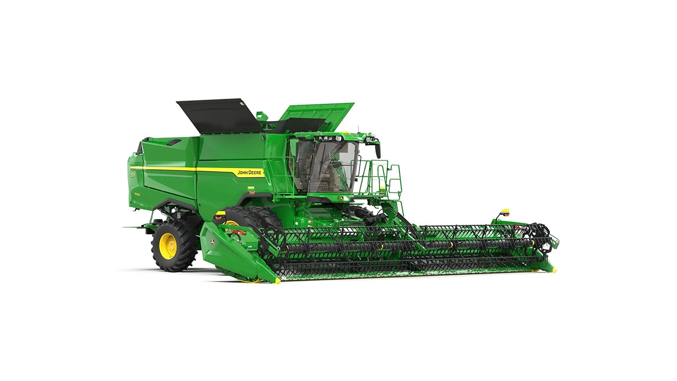 Photo of a John Deere S7 700 combine with a draper head on a white background