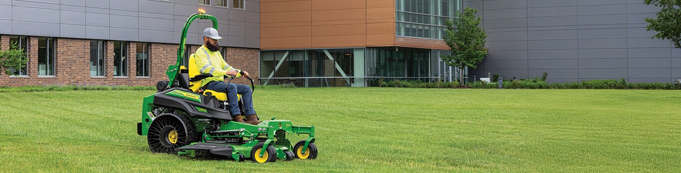 Person cutting grass on Z760R Zero Turn Mower on commercial property