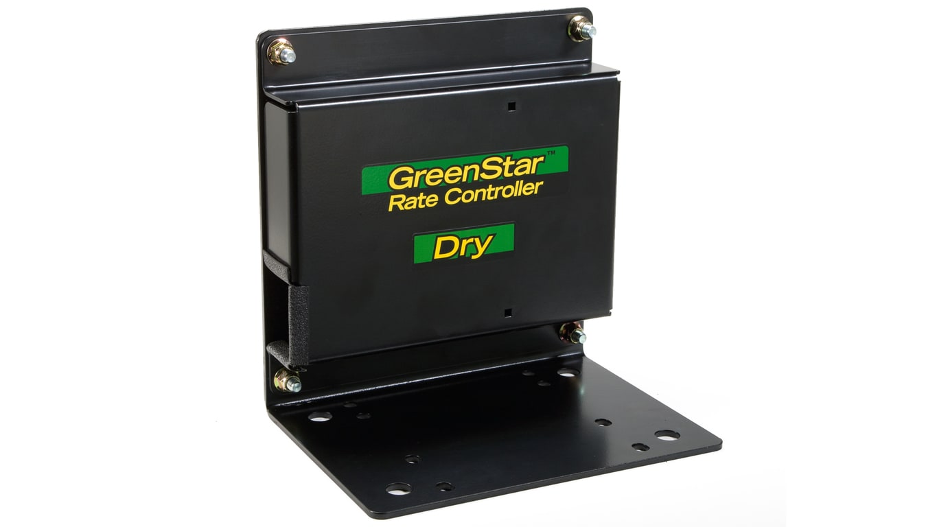 Black 'GreenStar Rate Controller Dry' device mounted on a metal bracket with screws.