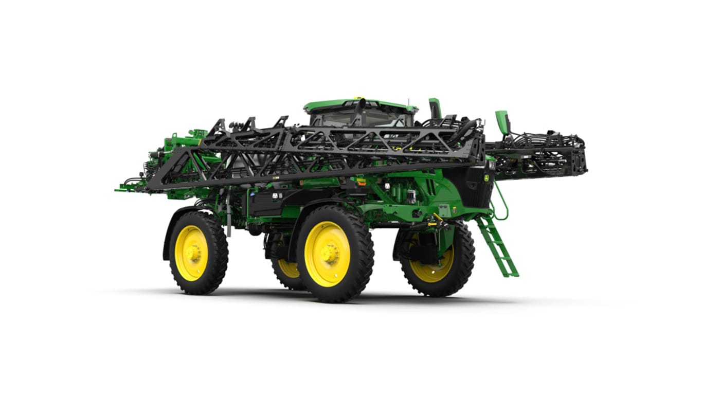 Front of a John Deere 412R Self-Propelled Sprayer with the booms folded.