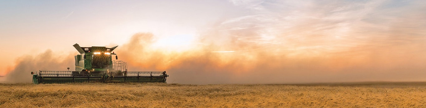Image of a combine harvesting wheat