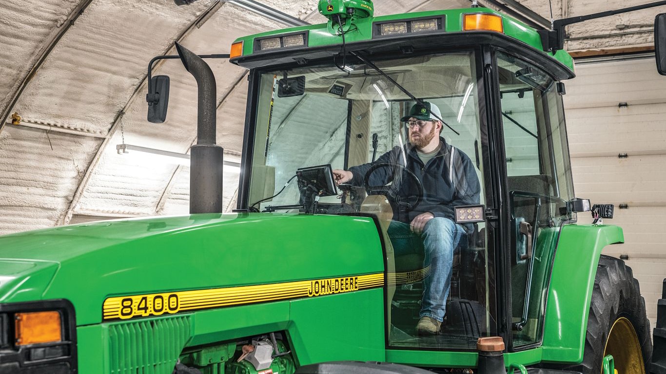 Man in 8400 Tractor