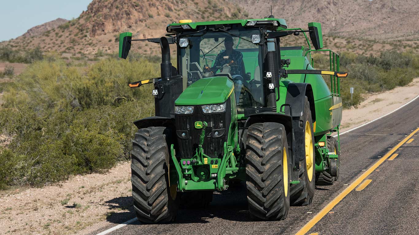 tractor driving on road