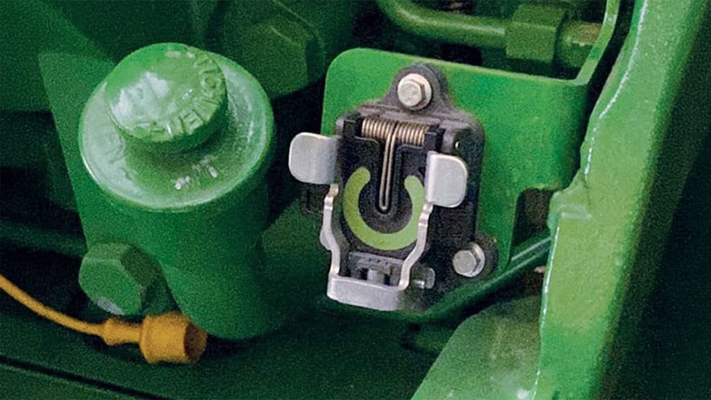 A close-up of a John Deere Rear Implement Ethernet connection point on tractor
